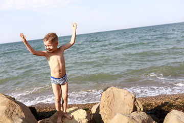 Child standing against Black Sea