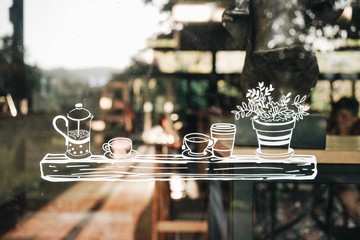 Cute white stickers on cafe window