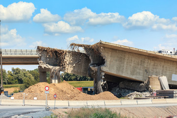 View of the destroyed road bridge as the consequences of a natural disaster