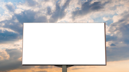 Fototapeta premium Mock up image: blank white billboard or large display with sun beams shining through clouds at sunset, front view. Consumerism, mockup, advertising, isolated white screen, template, copyspace concept