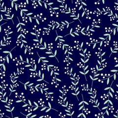 Vector seamless pattern of white berries with mint green vines on a dark navy blue background. Great for dressmaking fabric, bedroom decor and wallpaper.