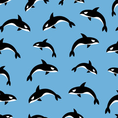 Vector seamless pattern of killer whales orca on a bright blue background. Great for sea and nautical themed decorations, textiles and stationery.