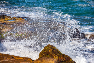 waves of the Atlantic Ocean crashing against the rocks
