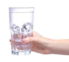 Glass of water with ice in hand on white background isolation
