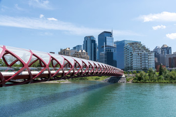 Calgary, Canada - July 31, 2019: Peace bridge and downtown in the background