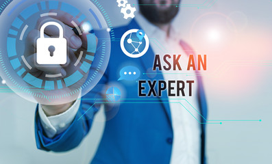 Handwriting text writing Ask An Expert. Conceptual photo consult someone who has skill about something or knowledgeable Male human wear formal work suit presenting presentation using smart device
