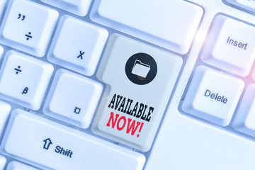 Text sign showing Available Now. Business photo showcasing you can find it obtain or operable at this current moment White pc keyboard with empty note paper above white background key copy space