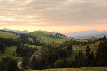 Fototapeta na wymiar Mount Beresnik, Smolegowa Skala and Kociubylska Skala at sunset. View from East (Rozdziela Pass). Pieniny Mountains, Poland.