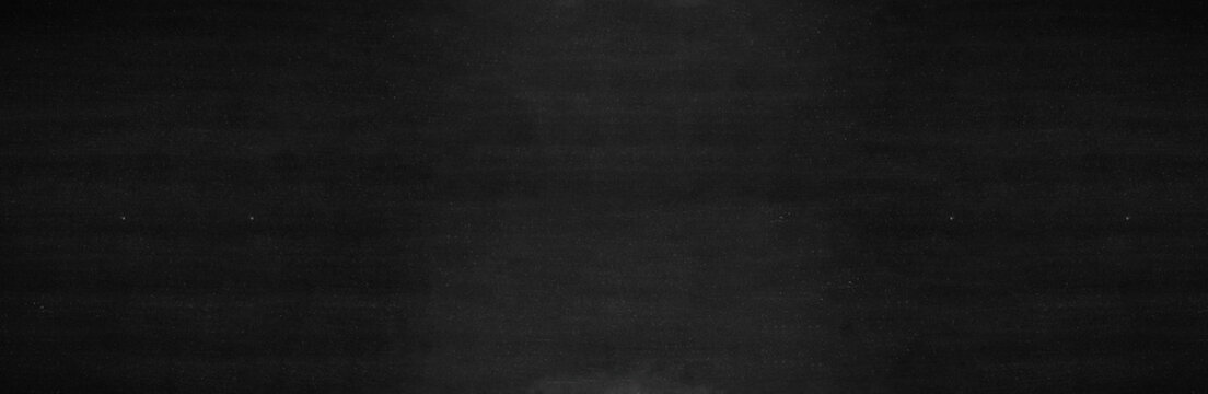 Blank wide screen Real chalkboard background texture in college concept for back to school panoramic wallpaper for black friday white chalk text draw graphic. Empty surreal room wall blackboard pale.