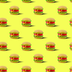 fast food pattern plastic burger on a yellow background