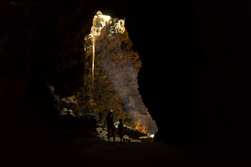 Amazing light shine through in Khao Luang Cave in Phetchaburi , Thailand.