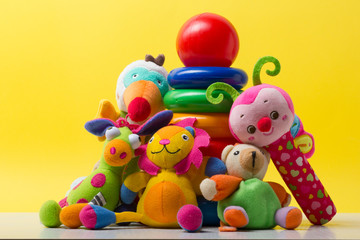 Kids educational developing toys frame on white background. Top view. Flat lay. Copy space for text