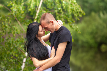 Loving young couple in park