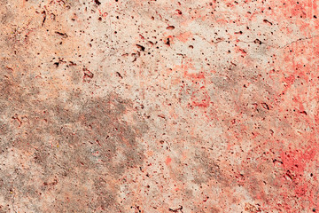 Texture of a concrete wall with cracks and scratches which can be used as a background