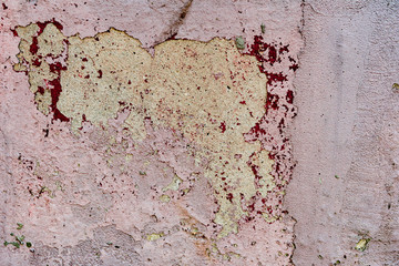 Texture of a concrete wall with cracks and scratches which can be used as a background