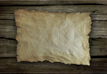 Old paper on the wood background