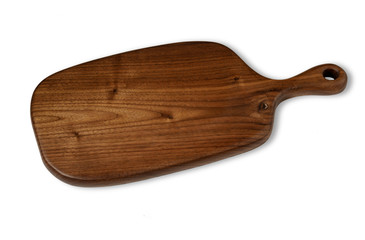 Walnut handmade wood cutting board on the linen