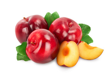 fresh red plum and slices with leaves isolated on white background