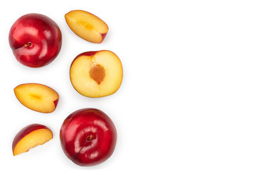 fresh red plum and half isolated on white background with copy space for your text. Top view. Flat lay