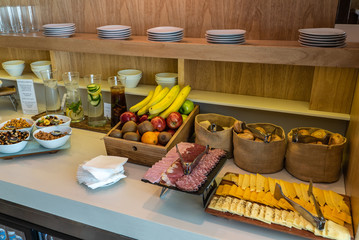 table with different types of snacks and fruits