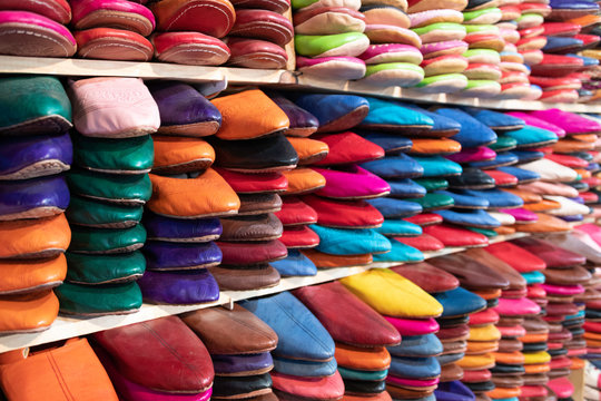 Colorful handmade leather shoes on display