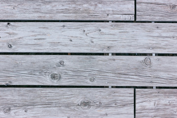 Gray dried wood planks. Wooden flooring top view. Floor texture