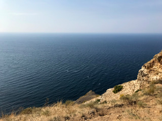Beautiful view of the Black Sea at Cape Fiolent in Sevastopol. Blue-green sea and mountains in Crimea