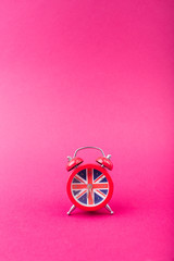 English clock with the colors of the British flag. Time to learn English.