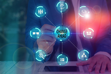 Writing note showing Change Ahead. Business concept for to replace with or exchange for another Become different Picture photo network scheme with modern smart device