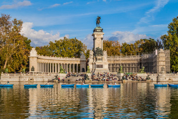 Fototapeta na wymiar MADRID, SPAIN - OCTOBER 22, 2017: Alfonso XII monument in Retiro park in Madrid.
