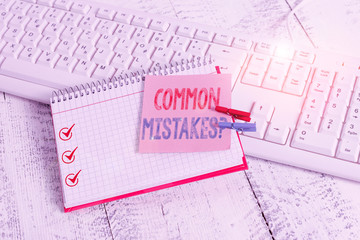 Writing note showing Common Mistakes Question. Business concept for repeat act or judgement...