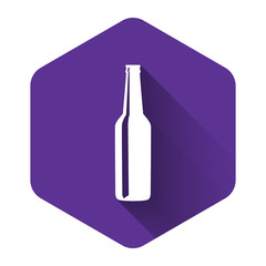 White Beer bottle icon isolated with long shadow. Purple hexagon button. Vector Illustration