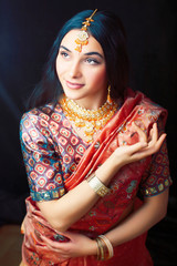 beauty sweet real indian girl in sari smiling cheerful, jewelry shining, lifestyle people concept