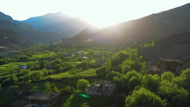 Drone footage of village in Ladakh Himalaya at time of sunset