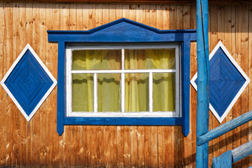 traditional russian architecture window in Eastern Kazakhstan in summertime