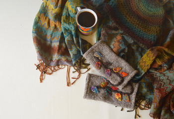 Hot chocolate drinks and warm scarfs to show concept of Autumn Season