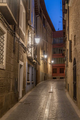 Narrow street in the center of Huesca, Spain.