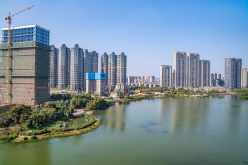 Fototapeta premium Meixi Lake City Island Viewing Platform and Construction of Intensive Real Estate in Changsha City, Hunan Province, China