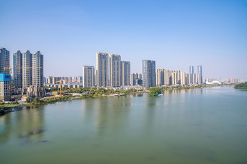 Fototapeta premium Meixi Lake City Island Viewing Platform and Construction of Intensive Real Estate in Changsha City, Hunan Province, China