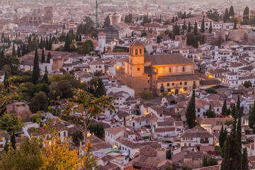 Obraz premium Aerial view of Granada with Salvador church during the sunset, Spain.