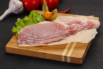 Raw pork bacon