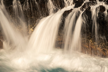 Fototapeta na wymiar Waterfall on the coastline of La Palma