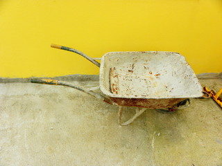 old and dirty metal garden trolley