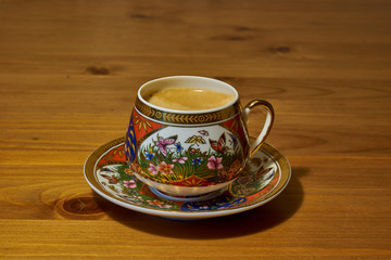 cup of coffee on a wooden table