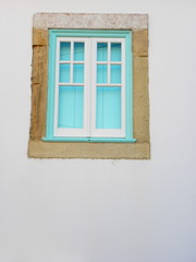 blue and white window in the wall
