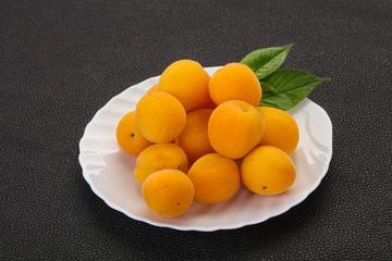 Ripe tasty sweet apricots heap