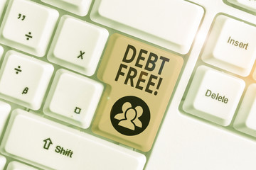 Conceptual hand writing showing Debt Free. Concept meaning does not owning any money or things to...