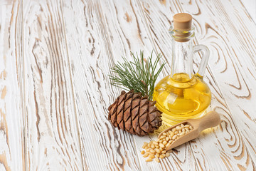 cedar oil in glass bottle
