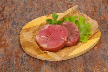 Raw tuna round steak for grill