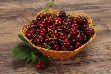 Sweet ripe cherry with leaves